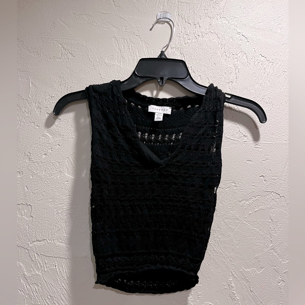 Black knit top Top shop
UK XS 
Eur 32-34
US 0-2